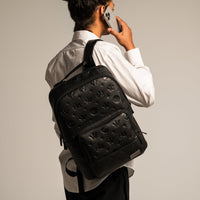 Gunmetal Monogram Leather Backpack